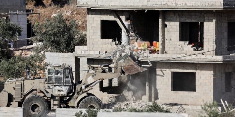 Israel investigates after videos show soldiers pushing bodies off West Bank roof